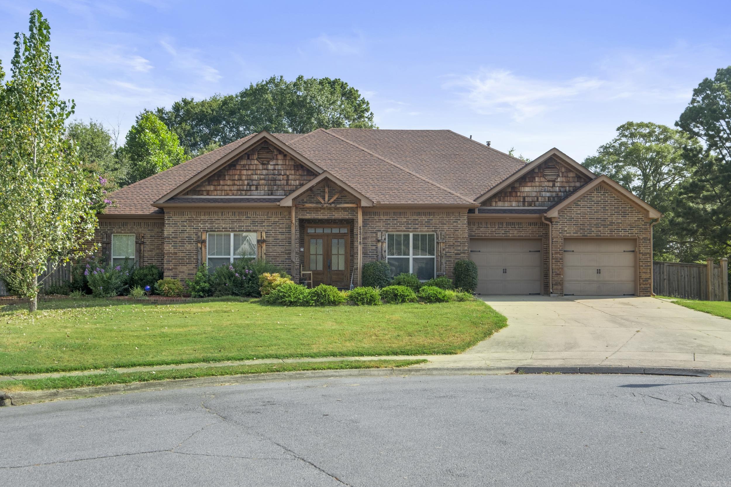 Tucked away at the end of a quiet cul-de-sac, this beautiful 4-bedroom, 2.5-bath home offers comfort, space, and style in one of Bentonās most desirable neighborhoods. Step inside to a warm, inviting living room with a cozy fireplace and wood floors that run throughout the main living areas. The split floor plan provides privacy, while the formal dining room and breakfast nook give you options for everyday meals or entertaining. The kitchen features granite countertops, a breakfast bar, and plenty of cabinet space. Tankless water heater and new roof. The large master suite includes a jetted tub, walk-in shower, and double vanities. Enjoy peaceful mornings or relaxing evenings on the screened-in patio overlooking a huge backyardāperfect for play, pets, or outdoor gatherings. This one checks all the boxes and wonāt last long. Call today to schedule your private showing!