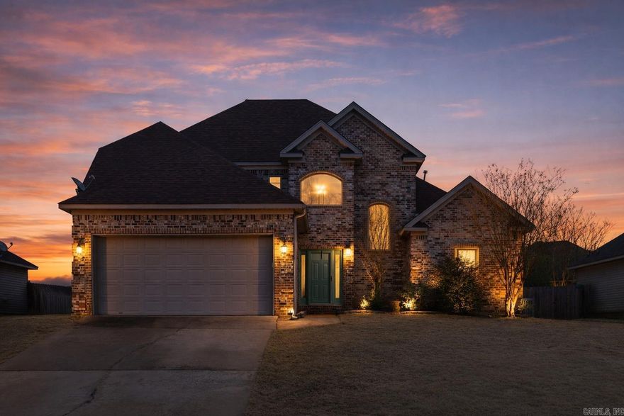 Welcome to 222 Pleasant Holly, a beautifully updated 4-bedroom, 2.5-bath home designed for comfortable everyday living. Step inside to an open-concept layout filled with natural light that creates a warm, welcoming feel.  The kitchen sits at the center of the home with plenty of cabinet space, generous counters, and newer appliances, opening seamlessly to the living room—perfect for entertaining or staying connected while you cook. A cozy fireplace adds charm and warmth to the space. 3 Spacious bedrooms upstairs, with the primary suite on the main level offering a private retreat complete with a soaking tub, separate shower, and walk-in closet. Three additional bedrooms and an updated full bath are located upstairs.  Recent upgrades include a new roof, updated flooring, high-end windows downstairs, refreshed bathrooms, professionally painted cabinets, fresh interior paint, improved landscaping, a redesigned back door for better flow, and added garage storage. Move-in ready and full of charm—don’t miss this one.