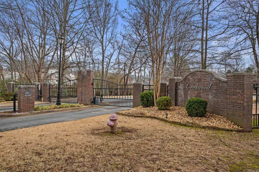 Nestled in a Serene, gated community this stunning home offers the perfect blend of luxury, comfort and natural beauty. Set beside a picturesque creek, the property provides a peaceful setting where you can unwind to the soothing sounds of water, and enjoy visits from local wildlife and birds. Inside, a dedicated Media Room awaits, complete with theater seating and newer surround sound equipment.The Heart of the Home is a chef's dream kitchen boasting top of the line appliances, elegant Brookhaven cherry wood cabinetry & quartz counters. The primary suite is a a private oasis with a handicap accessible bath with heated floors, a smart privacy window, luxurious steam shower & a custom walk-in closet. Additional features include a walk-in attic, 2 extra large BR's & Baths and a great laundry room. Whether you are enjoying a quiet morning by the creek, entertaining in the media room or preparing meals in the gourmet kitchen, this home delivers.  see agent remarks