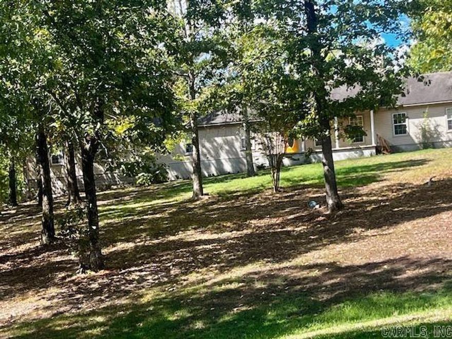 HUGE HOUSE looking for a large family, extended family, or anyone needing a place to spread out. House was formerly used to house foreign exchange students. This home is perfect for entertaining with its picturesque circle driveway, plenty of parking, large open living room, dining and kitchen areas. With a total of 6 bedrooms, including a master suite with a full bath, an additional full bath for guest, 3 bedroom each having a 1/2 baths, and 1 shared shower room — there's plenty of room for everyone. We won't stop there! Take everyone outside to lounge around the pool surrounded by a spacious wood deck, and completely enclosed by a wooden privacy fence. Additional outside spaces include approx. 3.95 acres with the house nestled on a small hill surrounded with just enough shade trees to enjoy a gentle breeze on those warm sunny days. More than enough room for the kids to run and play, and even a workshop/garage for the men or whoever would like to escape for just a little while. The house is priced in as is where is condition. A little TLC and your added touches will make this home a place to enjoy for many many years to come. Appraisal available in associated docs.