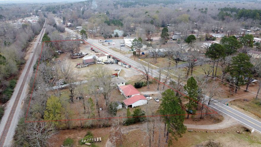 Opportunity in North Little Rock’s Oak Grove area! Sitting on approximately 1.23 acres. Versatile lot with excellent frontage and access along MacArthur Drive. This property may be purchased individually or together with four additional adjoining parcels—a total of five parcels (+- 3.76 Acres): 11013 MacArthur, 11015 MacArthur, 11003 MacArthur, 11007 MacArthur, and 10913 MacArthur. Combined, the assemblage includes three homes (one converted into an office) and multiple structures, providing outstanding flexibility for commercial use, expansion, or future development. A unique opportunity for investors, small businesses, or those seeking a substantial footprint in a growing corridor. Reach out for full parcel details and possibilities!      *** Drone Pictures highlights the entire 5 parcels For Sale