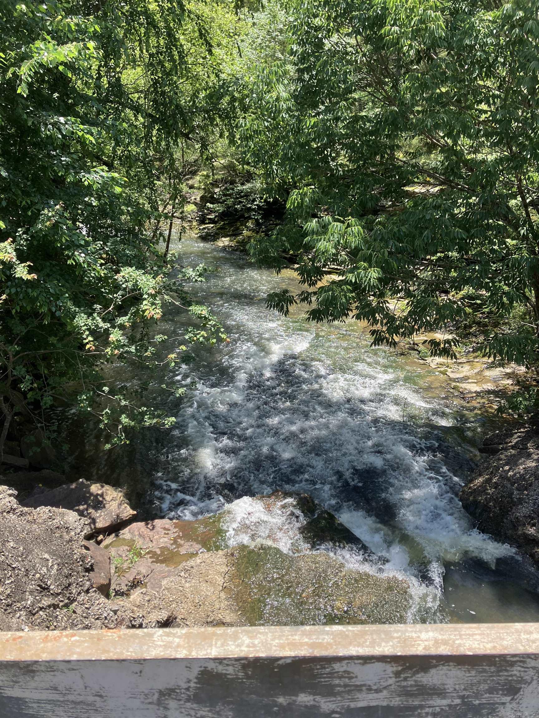 Great Budd Creek front lot. Unrestricted... Acreage to be determined by Survey. Lot Corners Brimmer & Mission. Only A Hop-Skip & a Jump to Shiloh Marina.