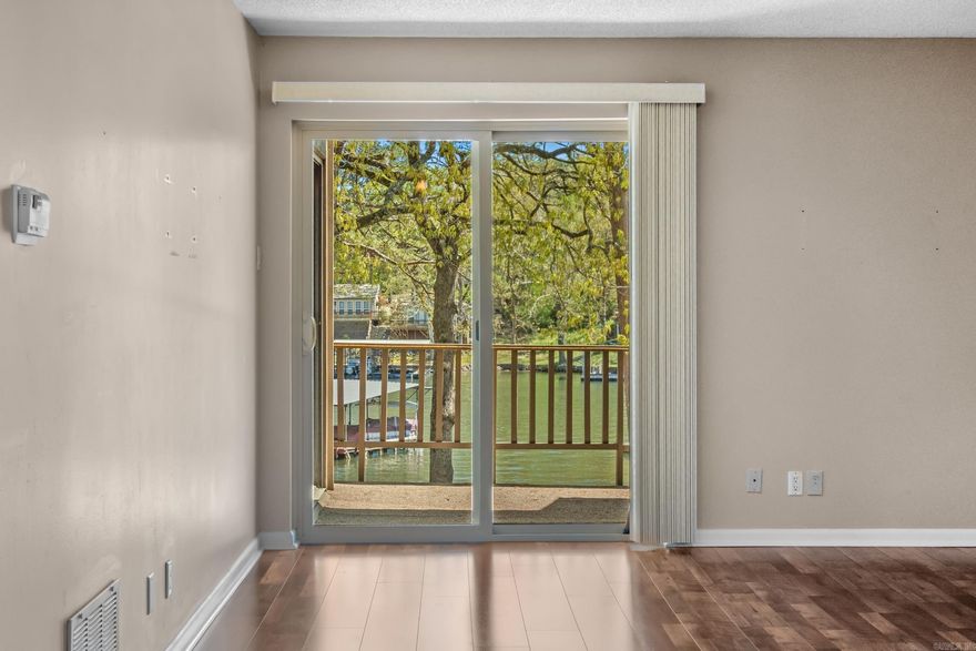 Lake Hamilton Condo-Move in ready! Beautiful upper level unit offering 2Bd/2Ba with views of the lake right from your living room. Open Dining/Living layout. This condo is perfect for a get away or a full-time stay. Year round water & just steps away from your covered boat slip. Call appointment center to schedule a showing. Centrally located this condo is convenient to everything Hot Springs has to offer by land or water!