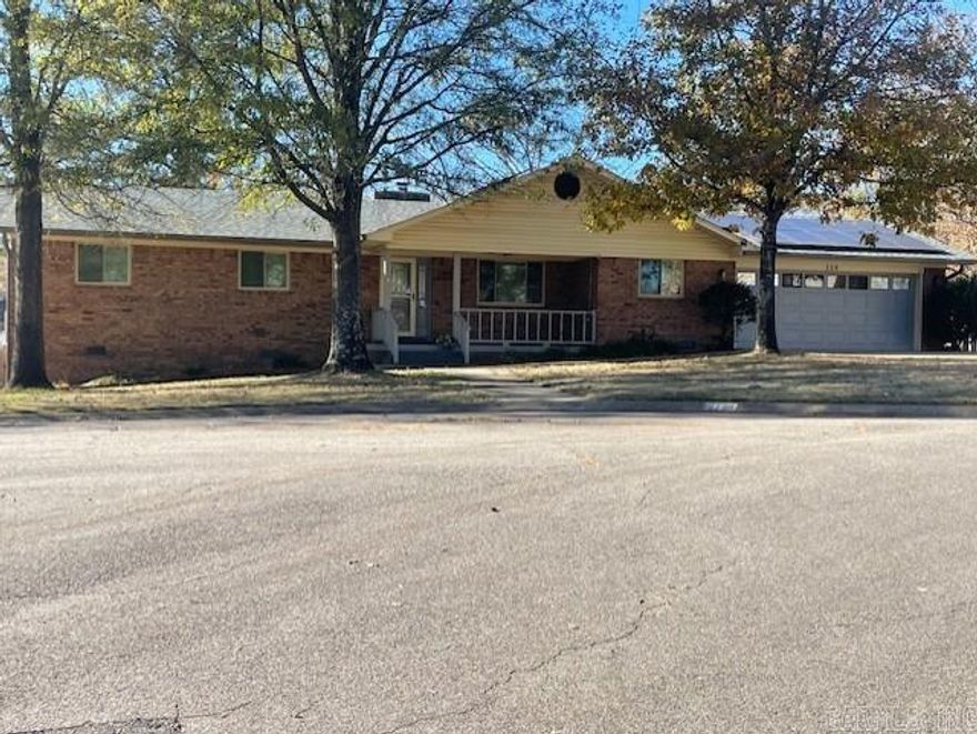 All brick home in established Lake Hamilton subd. This 3/2  home has been WELL maintained and seller has updated top to bottom! The garage is heated and cooled as well as the "man cave" below the home. HVAC, mini split, and new windows in 2025. Updates since 2020 include appliances, fixtures, water heater, garage door opener, paint, LVP flooring. 2023 new ROOF, new gutters w Leaf Filter , and solar panels for great savings on utilities! RING alarm/cameras convey (monitored for only $100/yr) Dryer & range can be gas or electric. When weather permits, open the windows and enjoy the attic fan. CUL DE SAC LOCATION NEAR WATERS EDGE WITHOUT THE LAKEFRONT PRICE!!! WATER VIEWS.  Private boat ramp for residents use. Deck and firepit in the well maintained back yard to enjoy outdoors and lake life. Lawn sprinkler waters from lake. Entire subd is well maintained...you will love calling it "HOME"...  AND it's SO CLOSE to shopping, restaurants, hospital, and OAKLAWN CASINO RESORT too!     AGENTS SEE REMARKS.