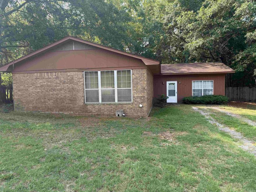 REALTORS read  Agent remarks!!!!   This home has the "good bones" you've been searching for and is ready for your personal touch. Currently offering a generously sized 2-bedroom, 2-living area floor plan, easily convertible back to its original 3-bedroom design. The layout is highly flexible, including a bright breakfast nook, a comfortable covered patio, and a spacious, fully gated backyard perfect for pets, projects, or play.