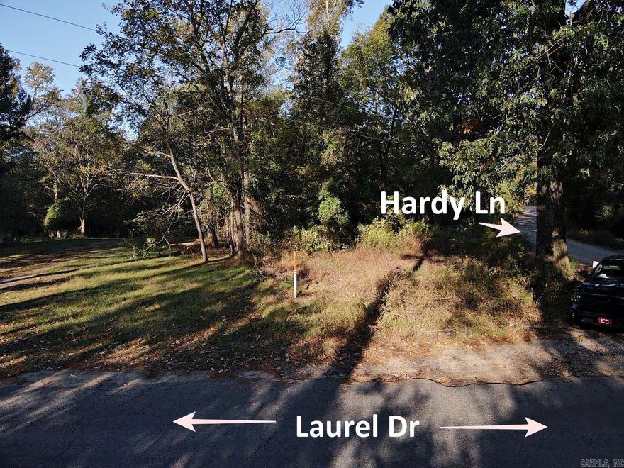 Discover 6.11 acres of unrestricted land just minutes from De Gray Lake and De Roche Creek--ideal for your dream home, large shop, barndominium, recreational retreat, or investment build. This level parcel features an existing pad site for a large shop, water meter already installed, and electricity accessible at the road. The property has previously passed a perc test, though a new test may be required for permitting. With no restrictions, this versatile property offers freedom to build or develop to your needs--residential, agricultural, or even small business use (subject to county zoning).