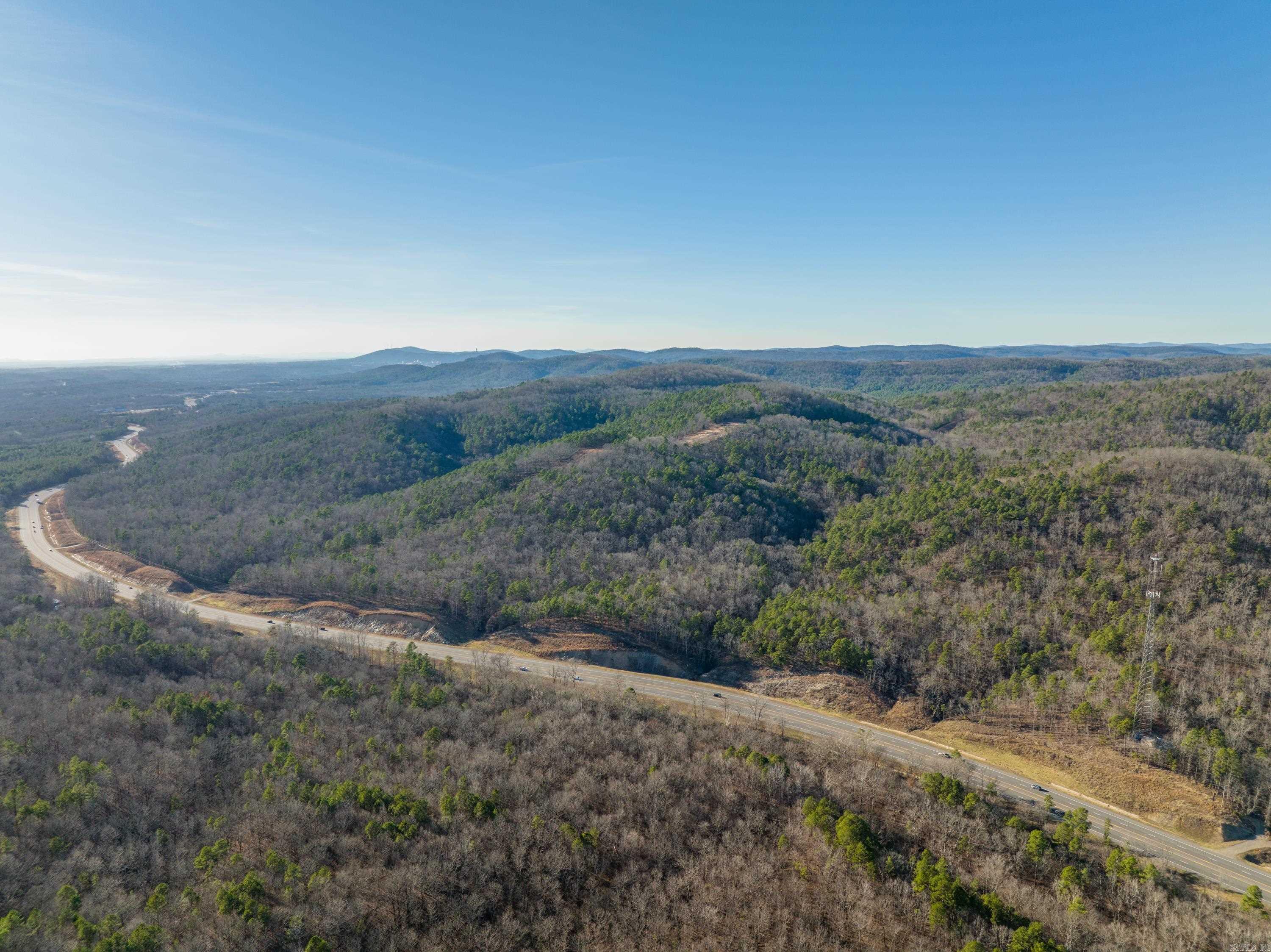 This is your chance to own a piece of paradise! 20 Parcels, totaling over 2,700 gorgeous acres, at the gateway into Hot Springs National Park! 4 Miles of HWY 70 Frontage. Stunning views. Prime Hunting Property. 1 Mile to the 270 Bypass.10 minutes to Historic Downtown Hot Springs. 10 Minutes to Oaklawn Hotel, Casino, and Racetrack. Huge commercial and development potential.