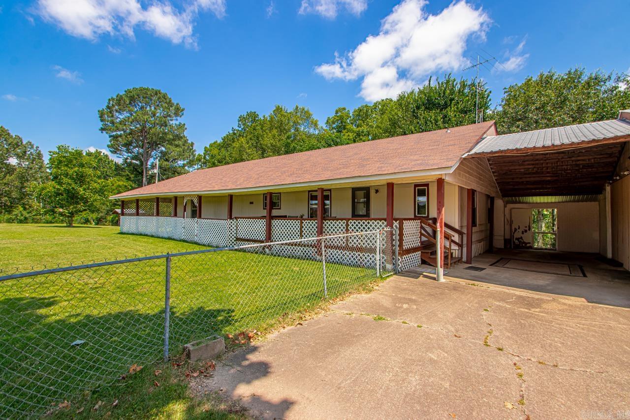 This home has 2 bedrooms with closets but the 3rd room does not have its own closet. 2 full bathrooms. New Roof 2025 on the home. The mobile home was added on to. It has a front covered porch across the front. Approx. 4.57 Acres total with both parcels included. This property will only be purchased by cash or in house financing from bank. It is not on a perm foundation. This home has been well taken care of and is very clean. There is a 40x40 shop and 39x26 carport. AC was done in 2017. Water heater 2013. Home will be sold AS IS. This property has a lot of potential for an investor or someone with livestock. There is currently a 2nd mobile home on the property that does NOT convey. It will be moved before closing. Call to schedule your showing today. Must show proof of funds or approval letter from bank with offer.