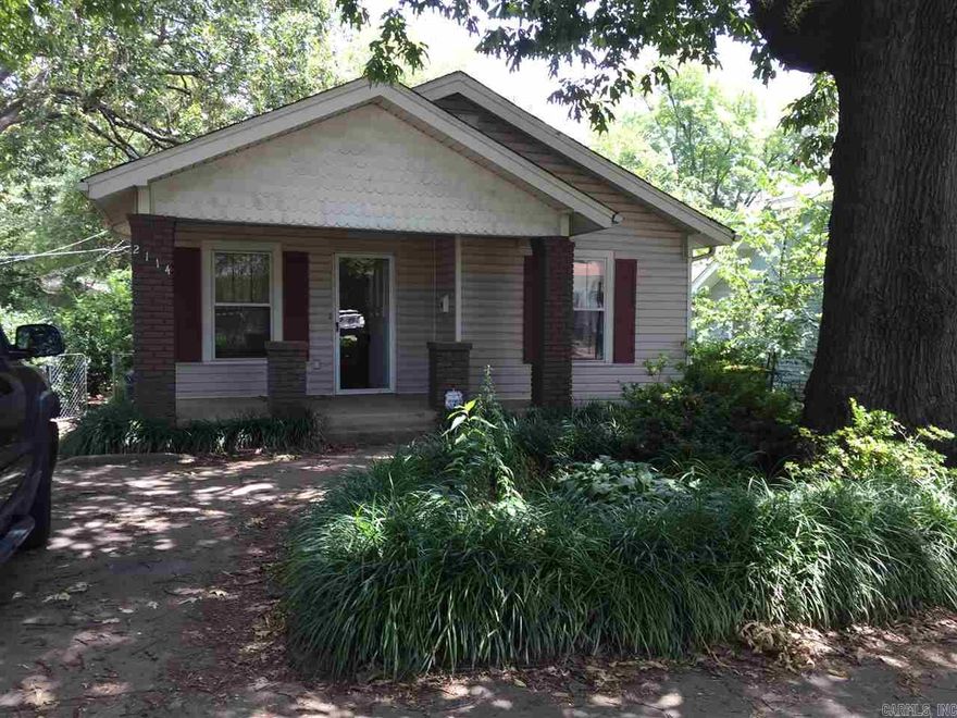 This craftsman style 2 bedroom, 1 bath house is one block from North Little Rock High School. This home was recently renovated with new floors, paint and kitchen counter tops, just to name a few. It also includes living room, dining room, kitchen and bonus area in the back. There is a nice storage building out back with a patio for entertaining.