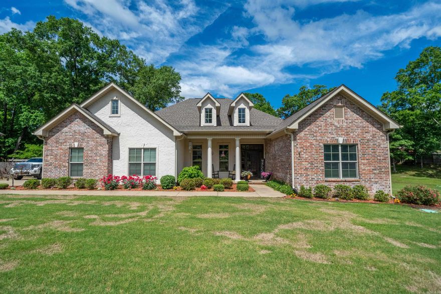 This beautiful 3-bedroom, 2.5-bath home is situated on nearly one acre in desirable High Meadow Estates, Lakeside School District. This well-maintained home features gleaming hardwood floors, a split floor plan filled with natural light, and two spacious living areas. The large kitchen offers a new double oven, ample cabinet space, a walk-in pantry and a cozy keeping room with a gas fireplace. Enjoy the Arkansas room with surround sound and backyard views year-round. The master suite includes a walk-in tiled shower, soaker tub, double sinks, and a large walk-in closet. Separate laundry with mudroom adds convenience. Move-in ready and full of charm!