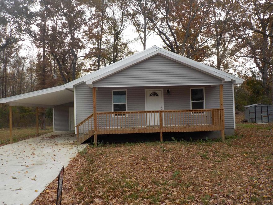 Cute cottage style house with good use of floor plan.  Open floor plan, kitchen, dining and living room open space, nice pantry, luxury vinyl plank flooring, metal roof, sep laundry area, carport with nice larger storage area with double doors for easy access, could be work shop.   Lot size is estimate.  Square footage from house plans.  Agents see remarks