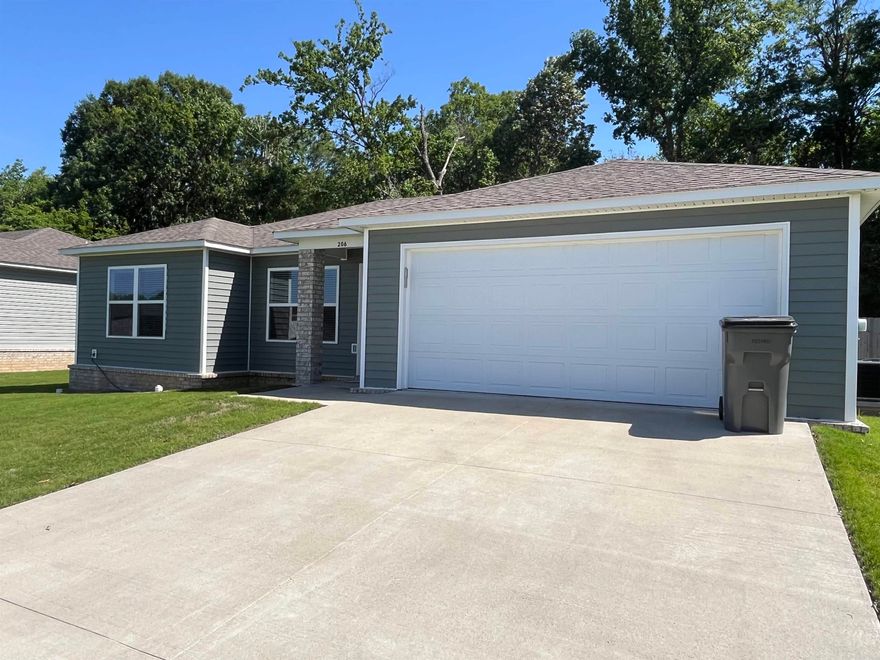 Very well maintained, must see! Welcome to the market, located at 206 Formon Drive in Paragould, Arkansas, this 2024-built, all-electric home offers three comfortable bedrooms and two full bathrooms. The home features easy-to- maintain luxury plank vinyl flooring in main areas, with carpet in the bedrooms. The primary suite includes a double vanity with large walk-in closet. There is a dedicated laundry room for your convenience. Outside, you'll enjoy a new screened, covered patio and a new composite deck--perfect for outdoor gatherings. It's a well-, move-in-ready home in a great neighborhood. Call to setup a showing on this beautiful home today.