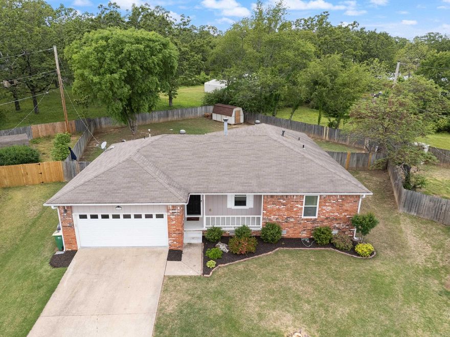 This inviting 4-bedroom, 2-bath home is set on an expansive level lot in the heart of Sherwood, this home offers all the space you need inside and out. The light-filled interior features an open-concept living & dining area, an efficient kitchen  & four spacious bedrooms—ideal for a home office, guest room, or a growing family. The primary suite includes its own private bath, offering comfort and privacy.  Outside is your own backyard oasis. Whether you dream of summer BBQs, a garden, or space for kids & pets to run, this yard delivers. Keep the 2 car garage free of mowers & bikes by utilizing the outside storage shed. On nights too chilly to be outside, enjoy the woodburning fireplace w/ gas starter. Tile & laminate floors throughout. New garage opener in 5/24 Water heater in 2021, new dishwasher in 2024, new deck in 2023, freshly painted trim & cabinets.  Located close to schools, parks, shopping & convenient to Highway 107 and 167/I 57. This home blends comfort, convenience, and opportunity. Affordable, adaptable, & absolutely worth a look—come see why this could be your perfect first home.  Roof inspections & other docs available for your buyer online. Agent Remarks