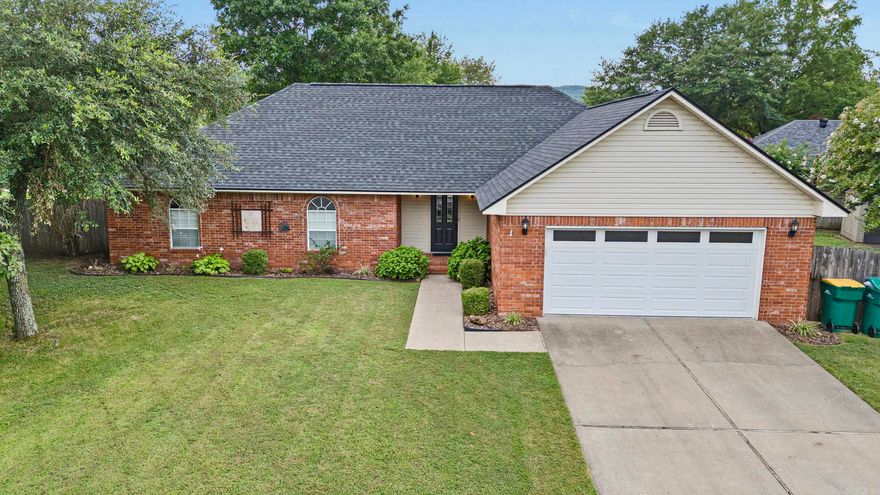 Welcome to your dream home! This charming 1,731 sq. ft., 3-bedroom, 2-bathroom residence is nestled in a peaceful cul-de-sac in a friendly neighborhood. Step inside to discover a freshly painted interior, complemented by new luxury vinyl plank flooring that adds a touch of elegance to every room. The spacious living area features a cozy fireplace, perfect for those chilly evenings. The modern kitchen offers plenty of counter space, ideal for family meals and entertaining. Retreat to the master suite, complete with a large, newly installed shower for your relaxation. The additional two bedrooms are perfect for a growing family, guests, a home office or extra storage. Call to see this one today! *One city lot, acreage approximated.