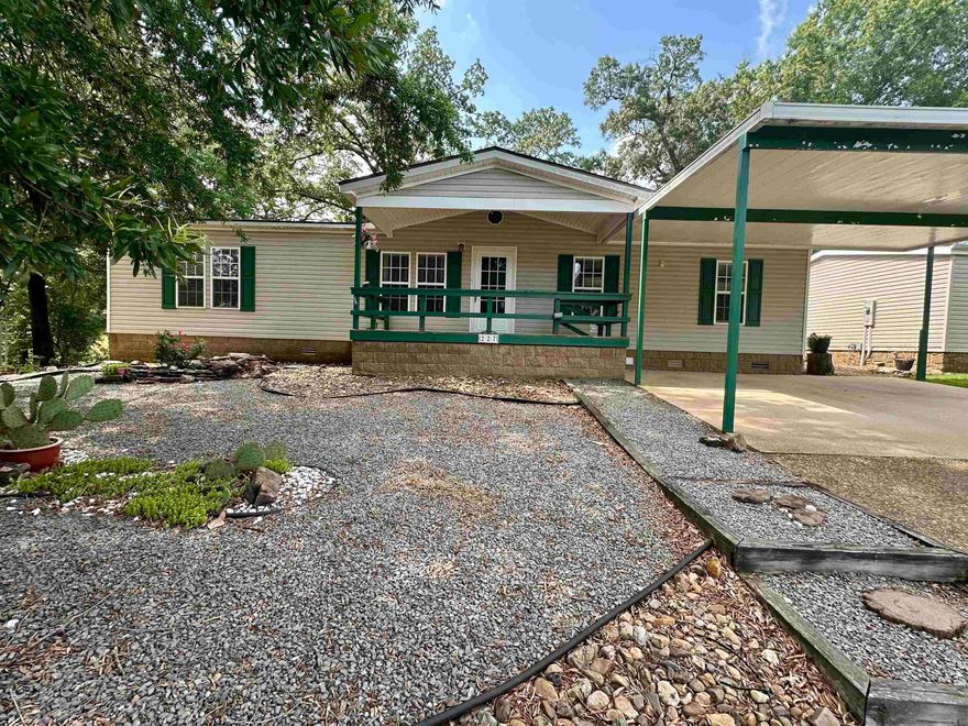This spacious, bright home with too many updates to list is located in a wonderful 55+ community with super low POA dues but lots of amenities for your entertainment! The home features a covered front porch, side porch and a 434 sq. ft., fully screened back deck with ramp covered in durable Chattahoochee river rock. Permanent foundation, with 2X6 exterior walls. Updates include: paint, AC unit, heat pump, 2024 roof, 2024 water softener, mini split in master, gas fireplace with extension available for master bedroom, stainless refrigerator and newer stove, basin in laundry room, LVP flooring, exterior doors, wood blinds and more. Master includes its own mini-split heat/air unit.  Plenty of room for entertaining in the amazing eat-in kitchen with lots of storage and cabinet space. Furnishings can convey. Simplisafe security system.