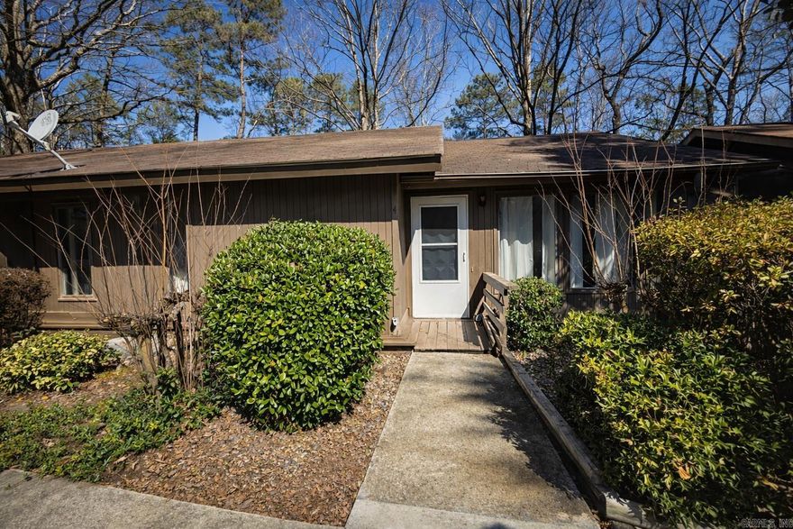 This 2-bedroom, 1.5-bath condo is tucked among mature trees and offers a private, serene setting with inviting deck space to enjoy the natural surroundings. The interior features a functional layout with good natural light, comfortable living areas, and neutral finishes throughout. Ideal for full-time living, a weekend retreat, or a low-maintenance, lock-and-leave lifestyle. Enjoy all the amenities Hot Springs Village has to offer while embracing quiet, easy living.