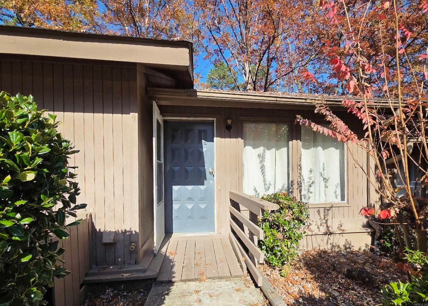 Welcome to this beautifully updated and furnished 2-bedroom, 1.5-bath condo just minutes from the West Gate. This move-in-ready home features stylish finishes with no carpet, a well-appointed kitchen, and a washer, dryer, and refrigerator that all convey. One bedroom offers direct access to the large back deck, perfect for relaxing or entertaining. Enjoy all the wonderful amenities of Hot Springs Village, including golf courses, lakes, and scenic surroundings. This charming condo is ideal as a full-time home, vacation getaway, or investment opportunity.