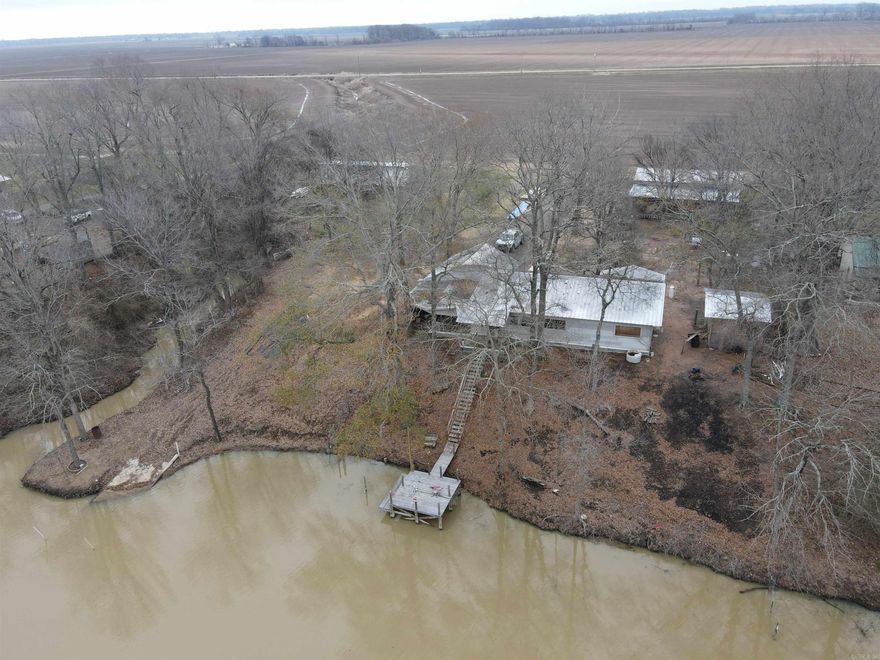 Get your fishing gear ready! This 1,100 sq. ft. property must be seen to appreciate. It sits right on the bank of Connerly Bayou with a beautiful large deck overlooking the water! It also offers a 12x24' screened in back porch, a carport for covered parking and a huge shop! The Crappie are biting, don't miss another fishing season, call me today. Be a perfect spot for to start a duck hunting camp as well a lot of WMA'S in the area.