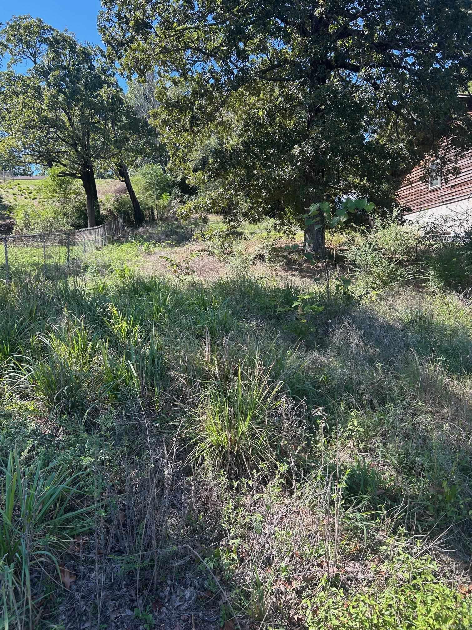 Lot on Lake Conway! This lot offers direct lake access and comes complete with a boathouseāperfect for fishing, boating, or simply enjoying the water. Youāll love the peaceful setting and beautiful views.