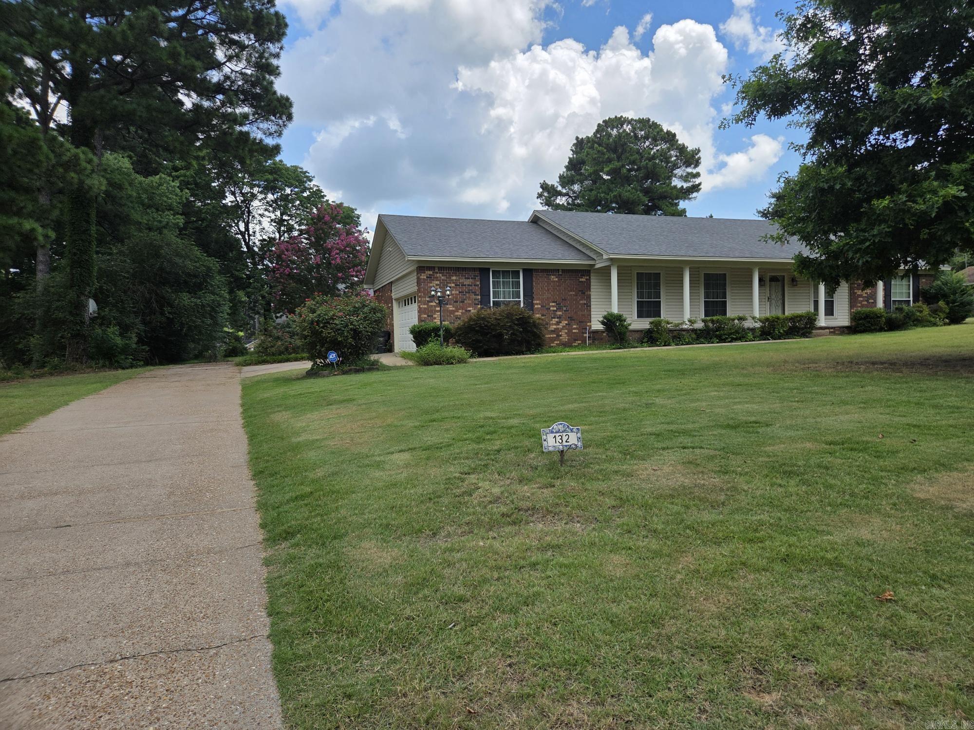 Rare find! Nice 4 bed, 2 bath brick house with 2 car garage & 24x36 shop on almost an acre just inside Searcy city limits! Pinewood Estates is known for spacious lots & a great walking area. One way in & out creates privacy & lower traffic. This house has updated granite countertops, hand scraped hardwood floors in living room, dining & hall areas with ceramic tile floors in galley kitchen & baths with carpet in the bedrooms. The 4th bedroom could also be used for office, pantry, craft, etc. The den has 2 ceiling fans & a wood burning fireplace. The shop has 110 & 220 amp & has a rollup door, electrical outlets & room to store your boat, atv, mower & all you other toys. Agent has ownership. See agent remarks.