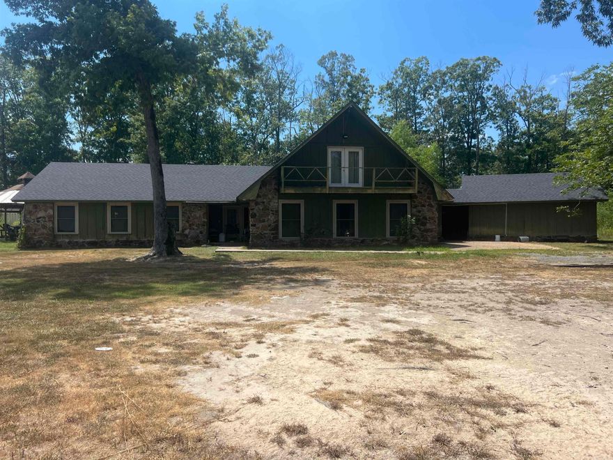 Great investment opportunity sitting on 7.2 acres.  This home has a pond in front, two outbuildings, one with a car lift, a large gazebo, a newer roof and a new whole house generator. Remodeling has been started and a garden tub and vanity will convey.