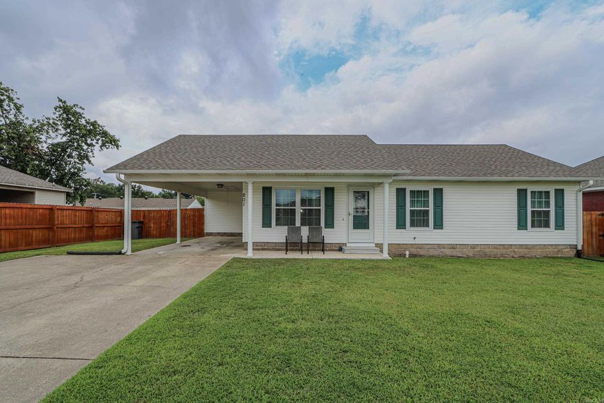 This charming 3-bedroom, 2-bathroom home offers a blend of comfort and modern updates. The interior features durable laminate flooring throughout, providing a clean and cohesive look. The bathrooms have been tastefully updated, with the primary bath boasting a luxurious walk-in tiled shower. A bright and inviting sunroom adds extra living space, perfect for relaxation or entertaining. The property also includes a convenient washer and dryer, making it move-in ready. Outside, you’ll find a fully fenced yard, ideal for pets or outdoor activities, along with a storage shed for additional space. This home combines practicality with style, making it a perfect choice for your next move.