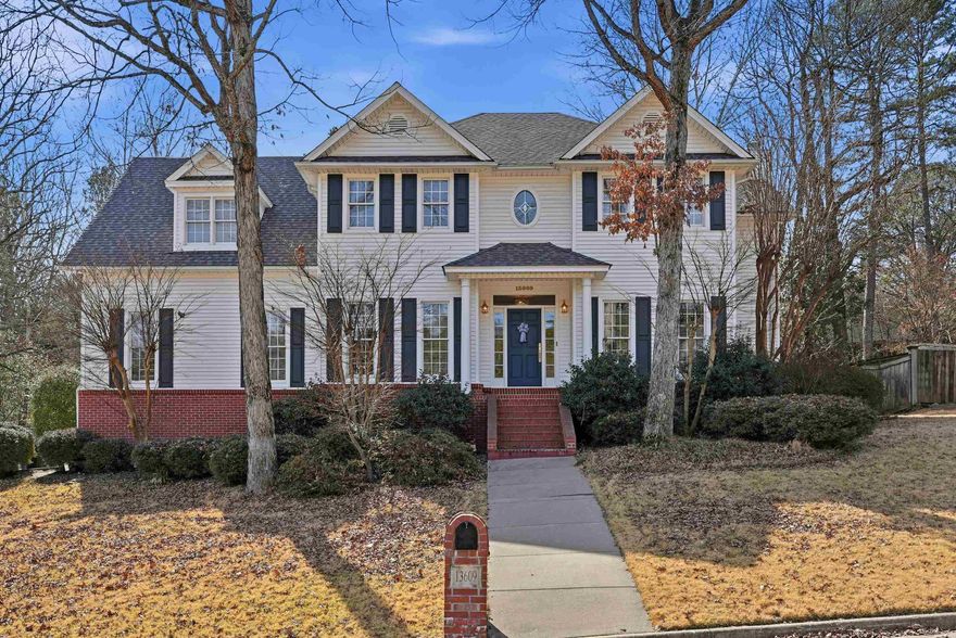 Welcome to this beautifully updated two-story Colonial offering 4 bedrooms and 3.5 baths. The remodeled kitchen features quartz countertops, stainless steel appliances, gas range, double convection oven, new Samsung Smart refrigerator, walk-in pantry, and additional storage for everyday functionality. A formal dining room and spacious living room provide ideal space for entertaining and comfortable daily living. Fresh interior paint throughout, new light fixtures, new kitchen hardware and faucets, updated doorknobs, and new outdoor lighting create a cohesive, modern feel. The expansive deck overlooks a fully fenced, private backyard surrounded by mature greenery, offering an inviting setting for gatherings or quiet evenings at home. Major updates include a new roof in 2024. The state-of-the-art Vivint security system includes cameras, glass-break sensors, and integration with thermostats and other smart home features. A full home generator ensures added security and convenience, while the two-car side-loading garage enhances curb appeal. Generous room sizes, thoughtful upgrades, and classic architecture combine to deliver a move-in ready home designed for both style and peace.