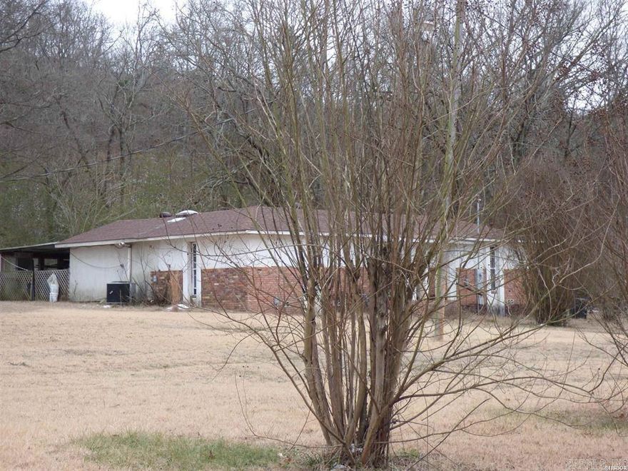 Welcome to the “Rustic Oasis” – where dreams collide with reality, and your tool belt becomes your best friend. This charming 3-bedroom, 2-bath abode sits on a sprawling 2-plus-acre canvas, ready for your artistic touch!  There is a huge upside to this investment!  RV parking spot, room for garden and another home if you desire!  don't miss out!