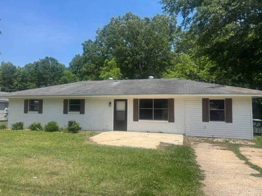 This charming move-in ready home is full of updates. Enjoy vinyl plank flooring throughout, with a spacious living room that flows into the modern kitchen featuring brand-new appliances, including a refrigerator, dishwasher, and gas stove, plus a bar perfect for barstools. A second bathroom has been added with a shower and convenient laundry area. All three generously sized bedrooms have ceiling fans, fresh paint, and an updated hall bath. Step outside to a large backyard with plenty of room for play, pets, or just relaxing and entertaining. Schedule your visit today to see everything this home has to offer.