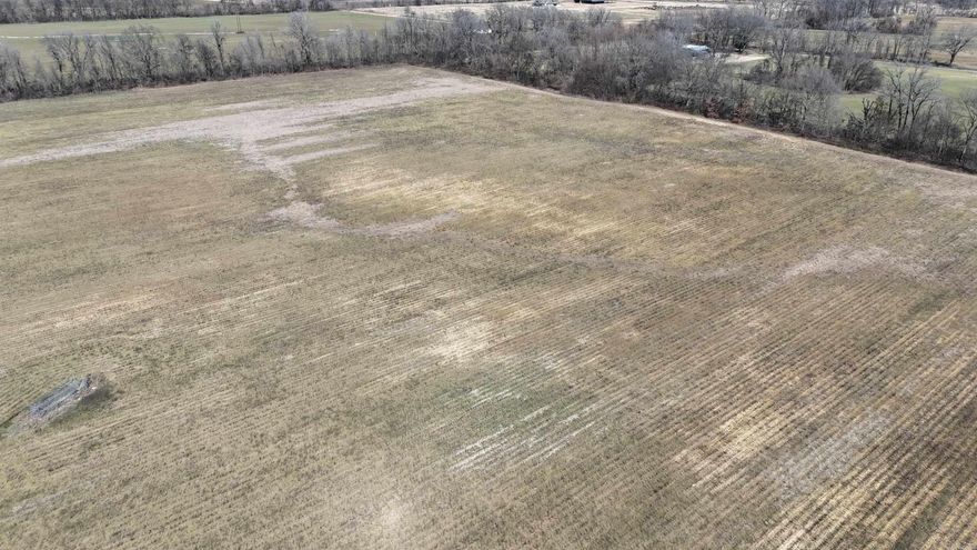 Investor special!! 31 acres of non-irrigated cropland and 25 acres of timber that would be perfect for hunting.  There is a house site included and pond.  All located right on Hwy 49 just East of Marvell.