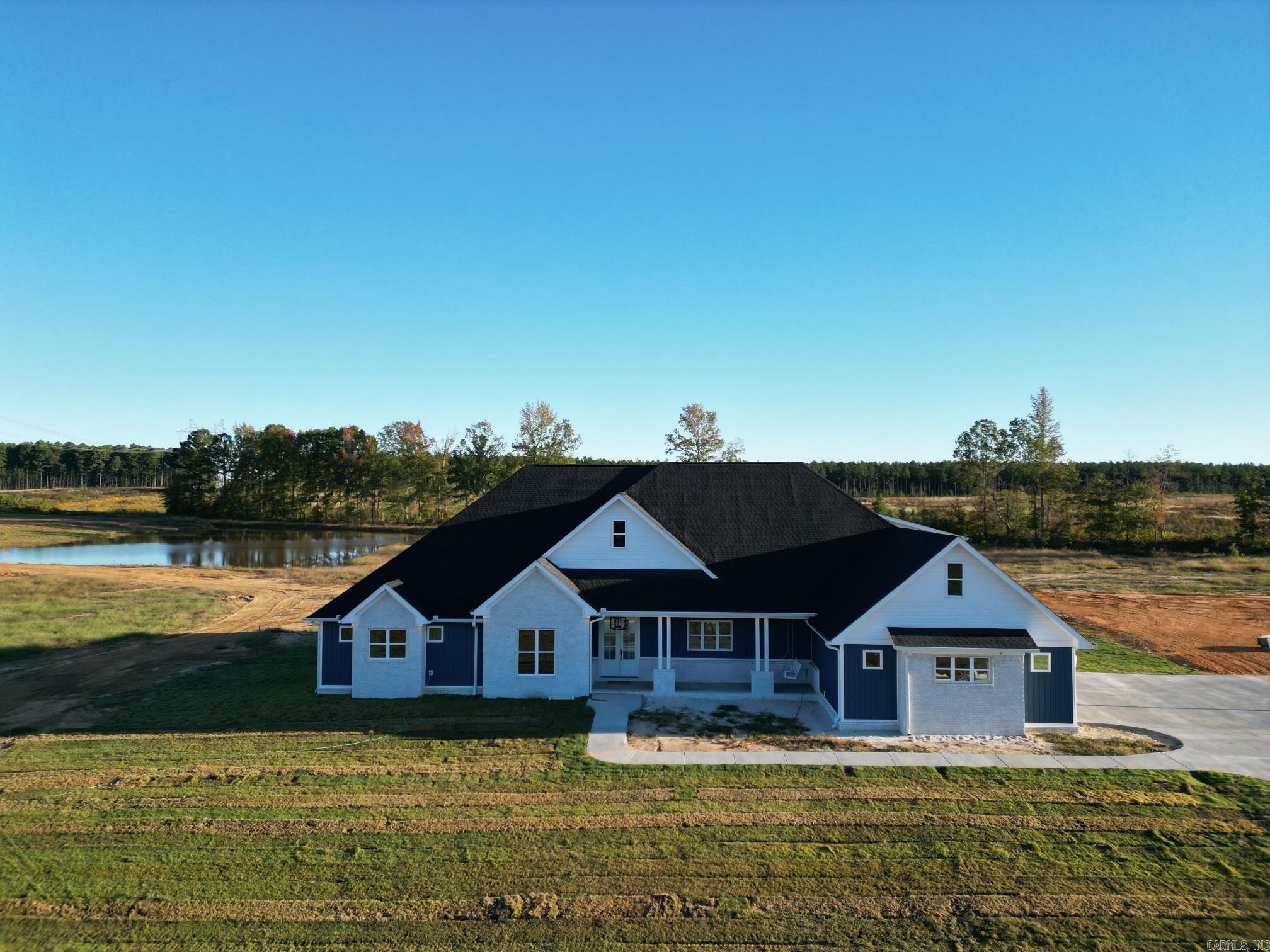 Beautiful new construction on over 6 acres. Split open floor plan. Shop with electric. Whole home generator.