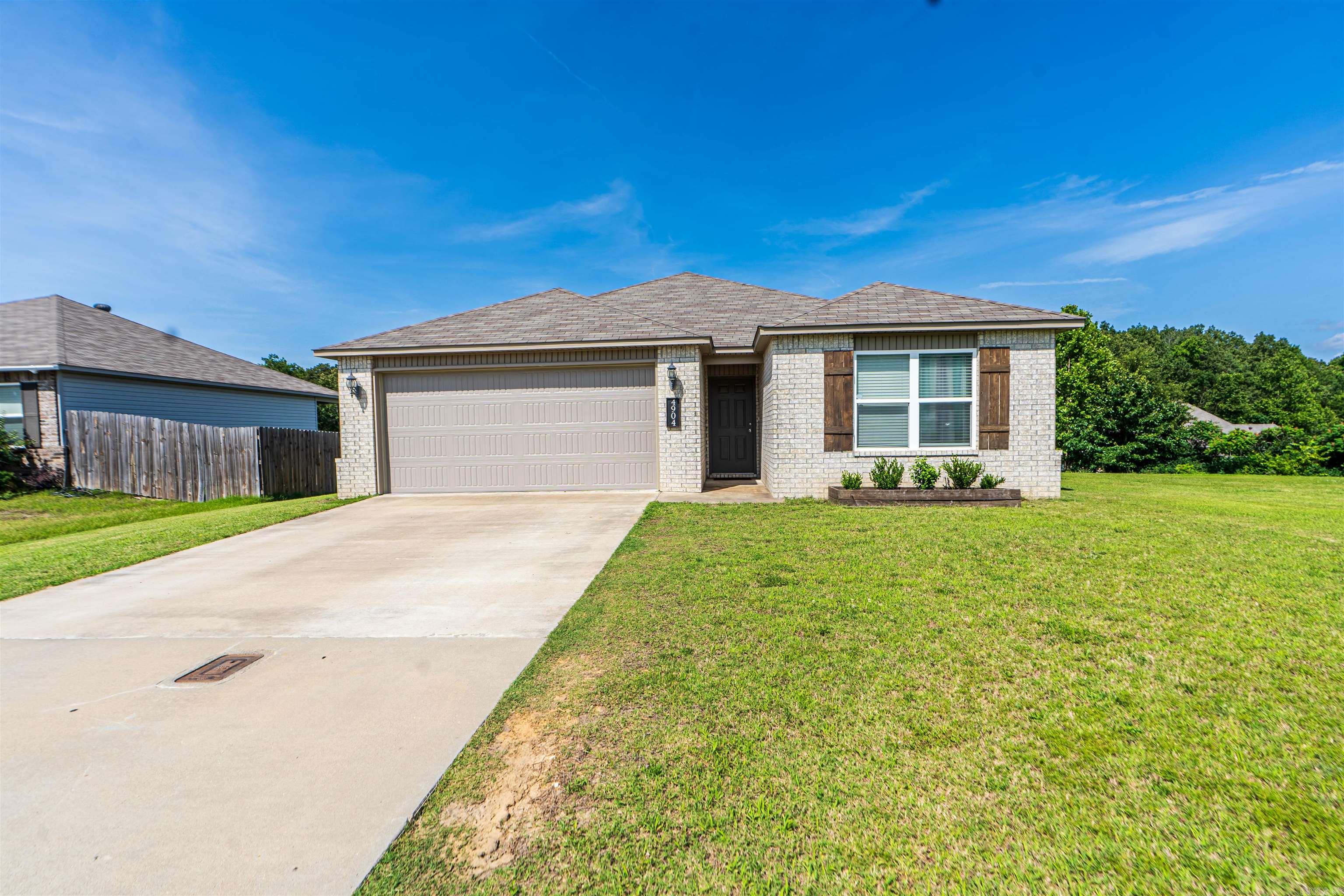 Welcome to 4904 Bedrock Drive! This 2020-built, move-in-ready home in the desirable Valley View area offers 3 bedrooms, 2 baths, and 1,556 sq ft of stylish living. Features include an open layout with vaulted ceilings, LVP flooring, stainless appliances, and a split floor plan for privacy. The spacious primary suite includes a double vanity, nice size shower, and walk-in closet. Enjoy a nice back yard good for entertaining and hanging out, and two-car garage—all just minutes from shopping, schools, and I-555. Don’t miss this one!