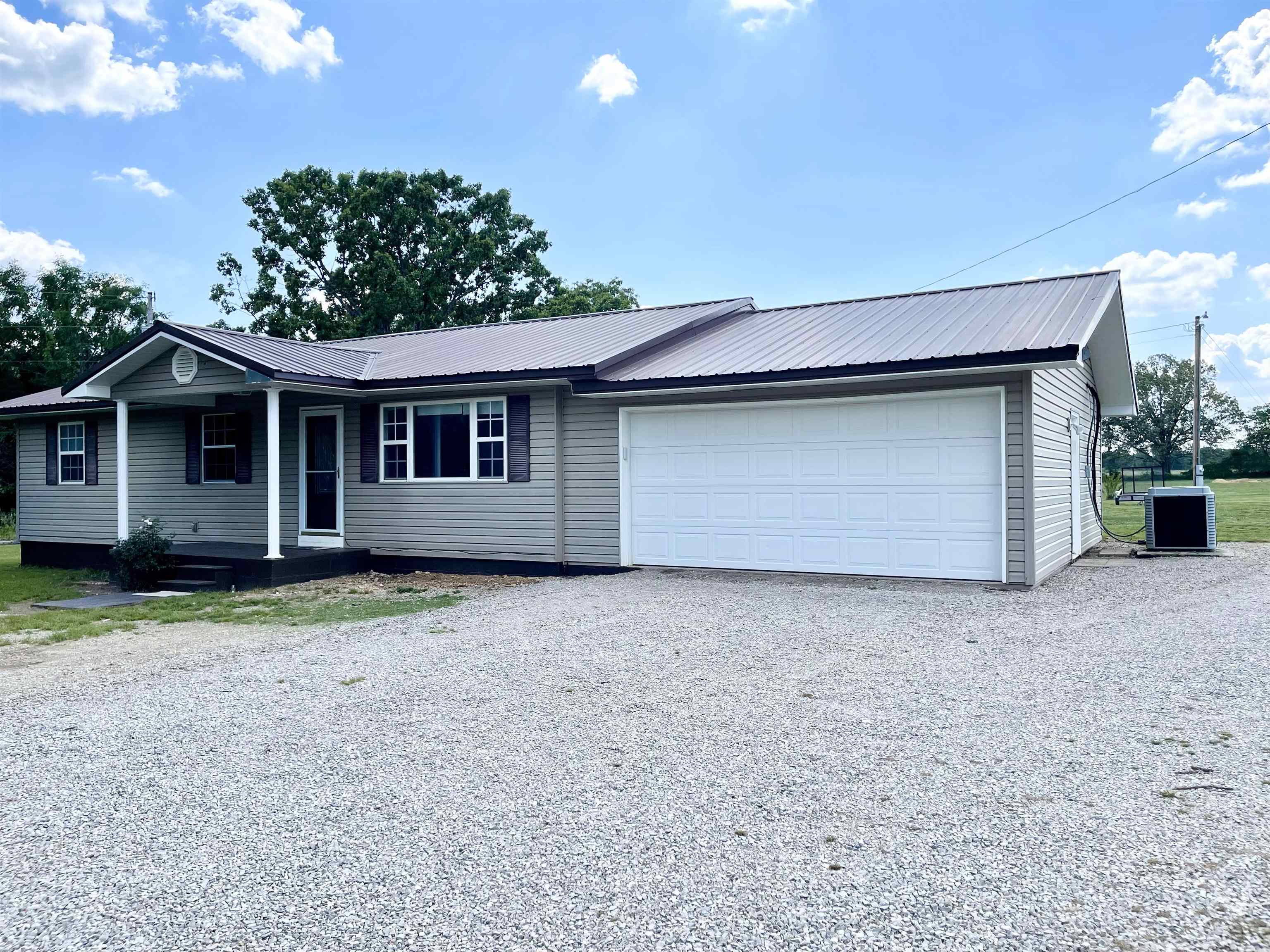 RARE FIND ā Two Beautiful Homes on 1.83 Acres! Discover a unique opportunity with this 3-bedroom, 2-bathroom home, 1232 sq. ft home and a 1568 double-wide manufactured home (3 Bed 2 Bath) with separate addresses and meters, offering incredible flexibility for multi-generational living or investment potential! County water plus a private well for added convenience Wheelchair ramps for easy entry Central heat and air, custom built fireplace, and a new large covered deck for relaxation Walk-in closets, pantry with pull-out shelves, and stainless steel appliances Step-in shower, jacuzzi tub, and double sinks for a touch of luxury A level yard, fencing for privacy, two sheds, and a garage Just 1 mile from the state highway, ensuring easy access This clean, well-maintained property is move-in ready and packed with features that make everyday living comfortable and convenient. Donāt miss this opportunity! Call today to schedule a showing!
