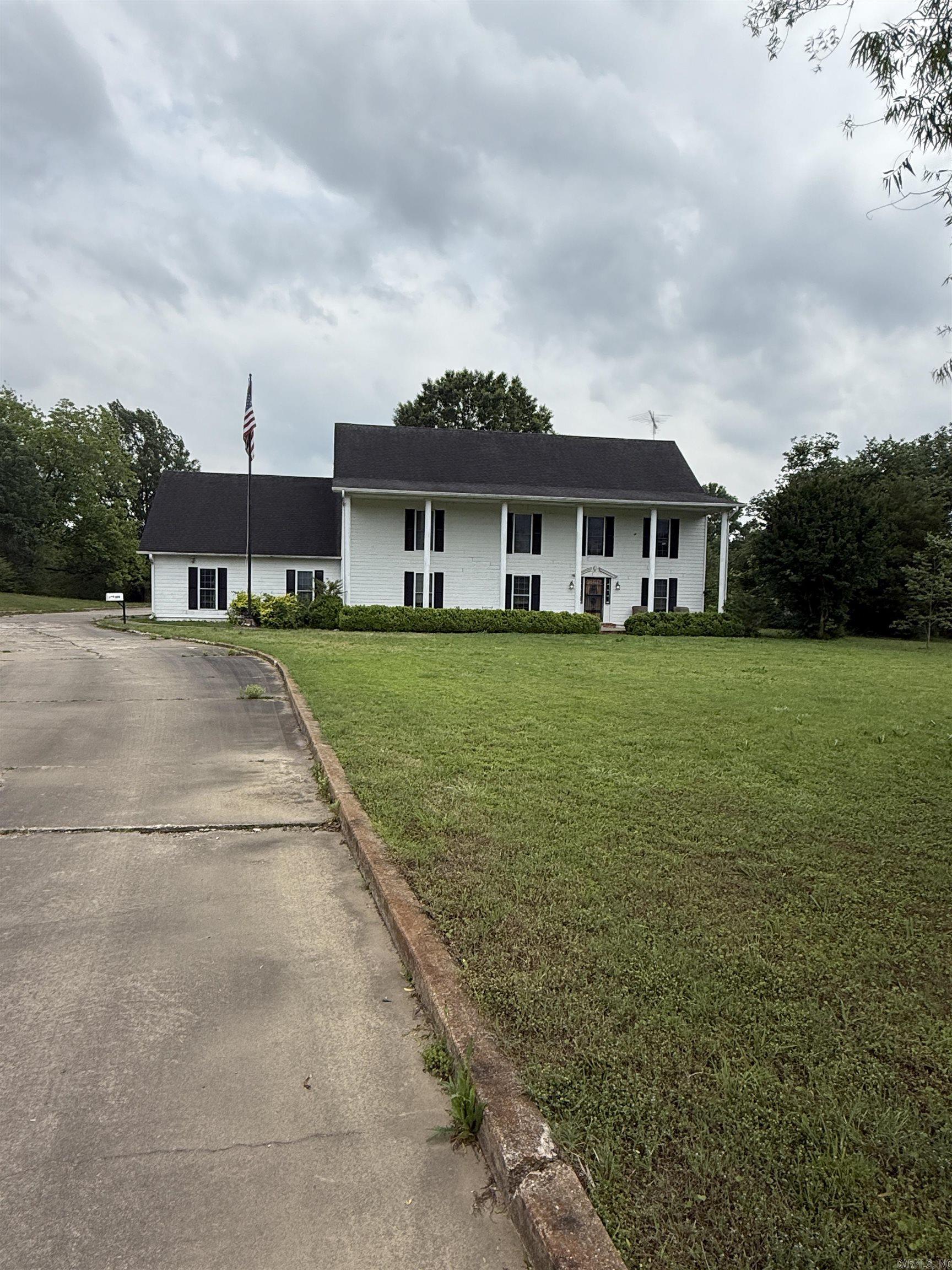 2.95 acres of property zoned C-4. The over 4000 square foot home sitting on the property has 5 bedrooms and 4 baths. This commercial space would allow for a growing business with four lane highway frontage and is situated between two current commercial businesses.