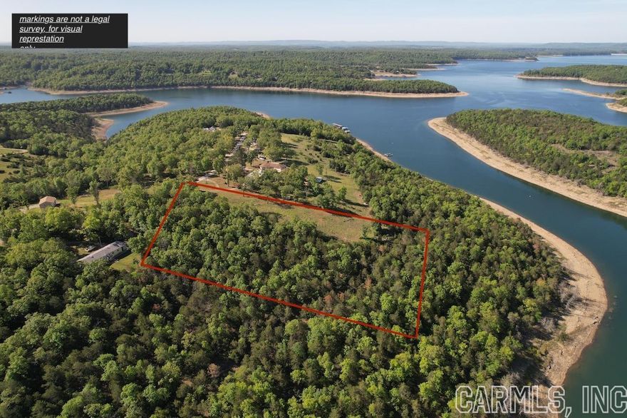 5 acre lot with Bull Shoals Lake view. This surveyed 5 acres is in the Promise Land area North of Mountain Home AR off of highway 5. Approximately an acre and a half of open ground with balance wooded . The lot joins the Corp of Engineers on 2 sides and hosts many Deer and Turkey. Access is provided by a short deeded easement which states it is also for utilities, both electric and public water are available. 8x14 Bald Eagle portable storage building recently placed and included with land has 2 windows a 4 foot door and loft storage on each end of building. Also included is Slip #3, 10x24 on Bass Bay Dock a private boat dock just down the hill from the lot. The slip has a 2 tank boat lift that can handle a 21 foot bass boat. All slip owners share the cost of maintenance and insurance currently $75/month. This dock is roughly 3 miles from Lakeview Marina near Bull Shoals Dam.