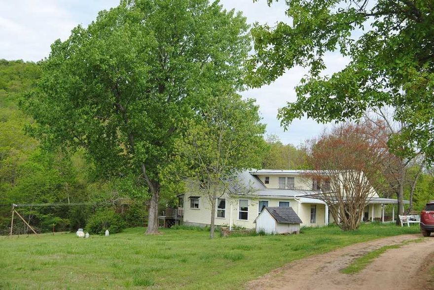 A BEAUTIFUL 160 ACRES WITH A YEAR ROUND CREEK, 2 TO 3 SPRINGS, HAS A SPRING FED POND, 2 WATERFALLS , APP. 30 ACRES IN PASTURE, BARNS,  END OF ROAD , VERY PRIVATE, HOME LAYS AT THE FOOT OF CAMPBELL MOUNTAIN, HAS A BEAUTIFUL OAK CABINETS IN KITCHEN, LOTS OF EXTRAS , SCREEN IN BACK PORCH, HOT TUB, ABOVE GROUND POOL. PASTURE IS FENCED, SHOP BUILDING,MINERALS CONVEY, TIMBER LAND, PRICED TO SELL, NEED TO CHECK THIS OUT, MORE COULD BE CLEANED UP FOR PASTURE, SOME UNDATES