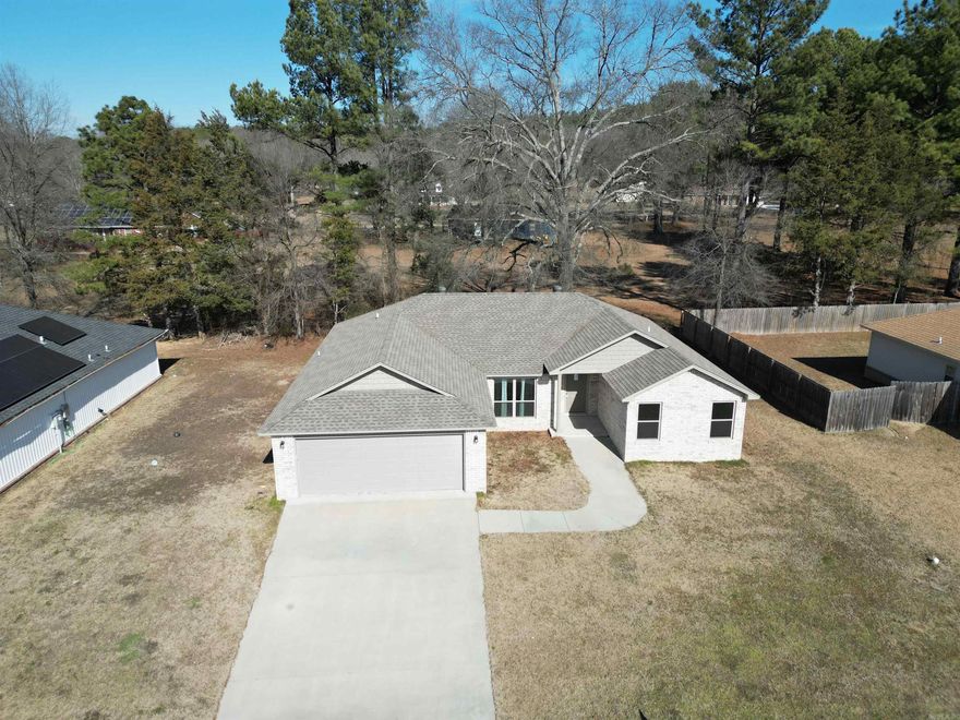 4 Bed 2 Bath brick home built in 2022. Offers a split floor plan, with partially open floorplan with both a dining room and breakfast nook. .6 miles to Dardanelle Primary, Mount Nebo, 7.2 miles to Russellville. low maintenance yard. Schedule a showing to see the natural light the home enjoys.