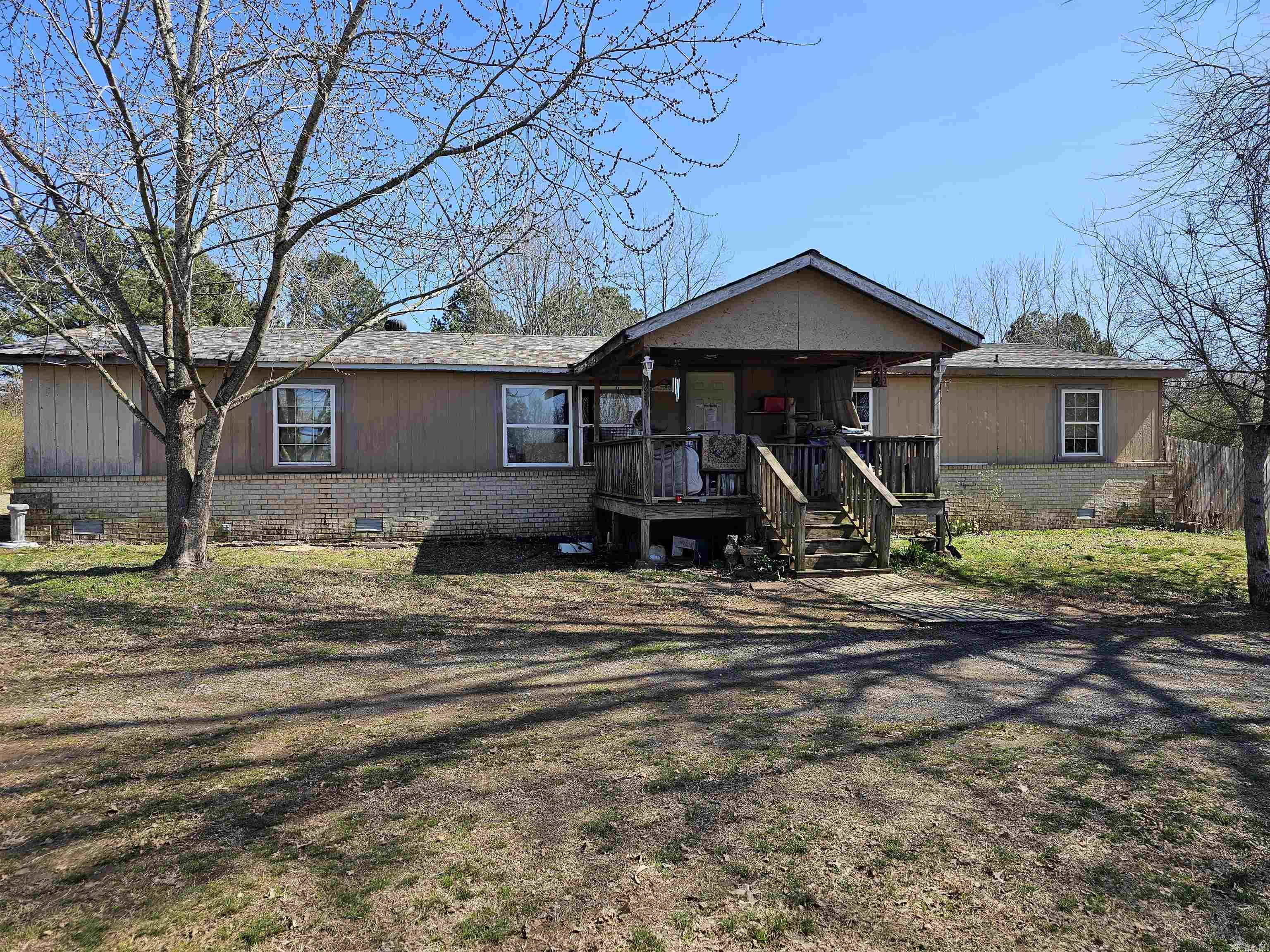 Large lot close to town. This is a large lot that would be great to build or move your new mobile home on. Home sold as is. Agents read confidential remarks.