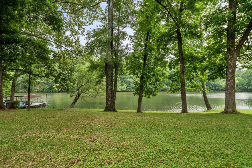 The Most Beautiful and Nicest Lakefront Property on Lake Catherine. 105 Foot Lake Frontage with a Seawall on this 1.3 Acre lot. Already has Electricity, City Water and Septic. Additionally it has a Well.  No POA/HOA Dues for this quiet Country Setting. 30' x 50" x12"  New Three Stall Garage/Workshop.
