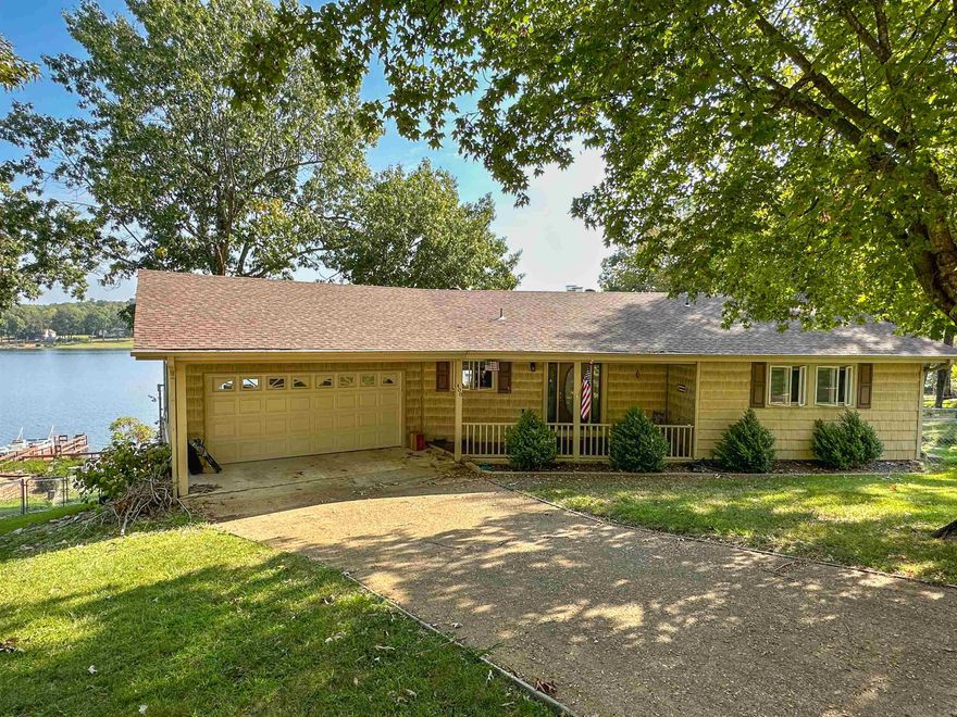 This beautiful 3 bedroom, 2 ½ bath Crown Lake Front home boasts your own private dock, approx. 100 ft of Crown Lake shore line, and gorgeous views of the 640 acre lake from multiple rooms throughout the home.   Multi-level decking provides ample entertainment space or a place to relax and unwind and enjoy the peace and serenity of lakefront living.  Nice custom wood fireplaces on both the main level and walkout basement provide warmth on a cold winter night or a back up or additional heat source.  Make an appointment to see this great property today!