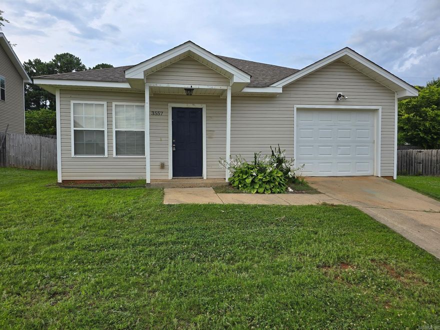 Welcome to 3557 Terrace Hill Court, a charming residence nestled in the heart of Benton, AR. This delightful home boasts three spacious bedrooms and two full bathrooms, offering ample space for comfortable living. The property is enhanced by a fenced-in yard, providing a secure and private outdoor space for relaxation or entertaining. A garage is also included, offering convenient, sheltered parking or additional storage. The house is characterized by its super cute aesthetic, making it a warm and inviting place to call home. Experience the perfect blend of comfort, convenience, and charm at 3557 Terrace Hill Court. This property accepts Section 8.
