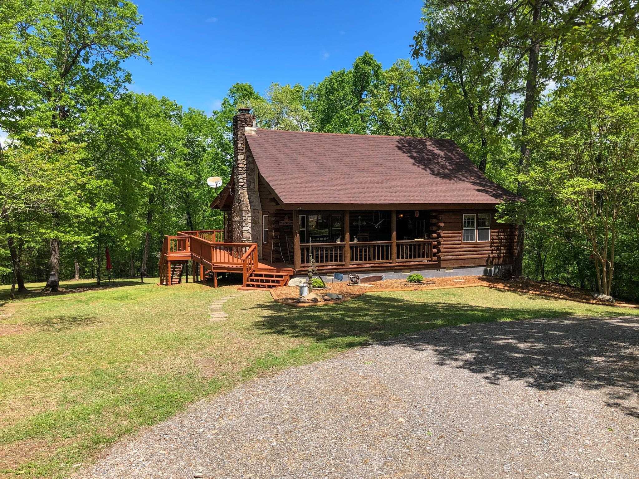 Welcome to your dream vacation destination, nestled in the serene beauty of the Ouachita National Forest! Our property offers the perfect blend of rustic charm and modern convenience, making it an ideal getaway for gathering groups, or corporate retreats. Here's what makes our vacation rental truly special. Main Log Cabin sleeps up to 8 guests and features a warm and welcoming atmosphere with all the amenities you need for a comfortable stay. Bunkhouse sleeps up to 16 guests, ensuring everyone has a place to relax and unwind. Fire Pit with Seating: Gather around the fire pit for storytelling, roasting marshmallows, or simply enjoying the tranquil surroundings. Game Area: Engage in some friendly competition with games like badminton and corn hole, set against the backdrop of nature's beauty. Our vacation rental is a gateway to endless outdoor adventures: Explore the breathtaking trails and wildlife right at your doorstep. Ouachita River: Just a mile away, enjoy public access for fishing, swimming, canoeing, and kayaking. Property comes furnished except antique furniture and antique yard dec
