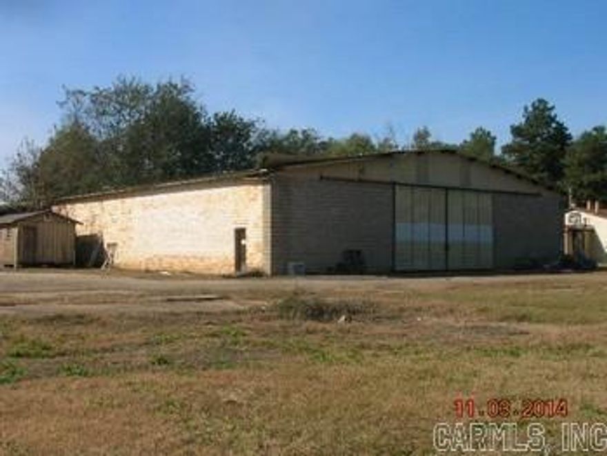 Centrally located in Town with lots of different possibilities for use.  Has a 10,000 sq. ft. warehouse and also an equipment shed.  Chain linked fenced.