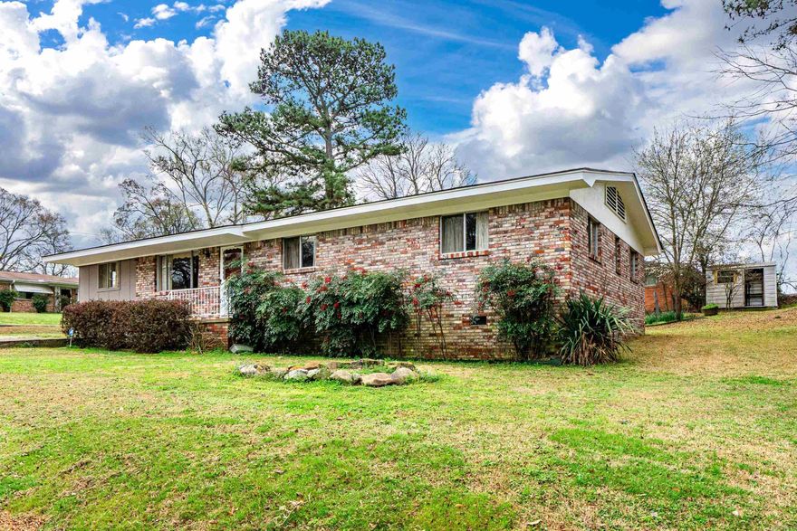 LOCATED IN HOT SPRINGS SCHOOL DISTRICT. THIS CHARMING 3 BEDROOM 1.5 BATHROOMBRICK HOME OFFERS CONVENIENCE AND INCREDIBLE POTENTIAL. CENTRALLY LOCATED, THIS PROPERTY PROVIDES EASY ACCESS TO SHOPPING, DINING AND EVERYTHING THE AREA HAS TO OFFER.FUNCTIONAL LAYOUT WITH SPACIOUS LIVING AREAS  LARGE FLAT BACKYARD GREAT FOR GARDENING , PETS OR OUTDOOR ACTIVIES