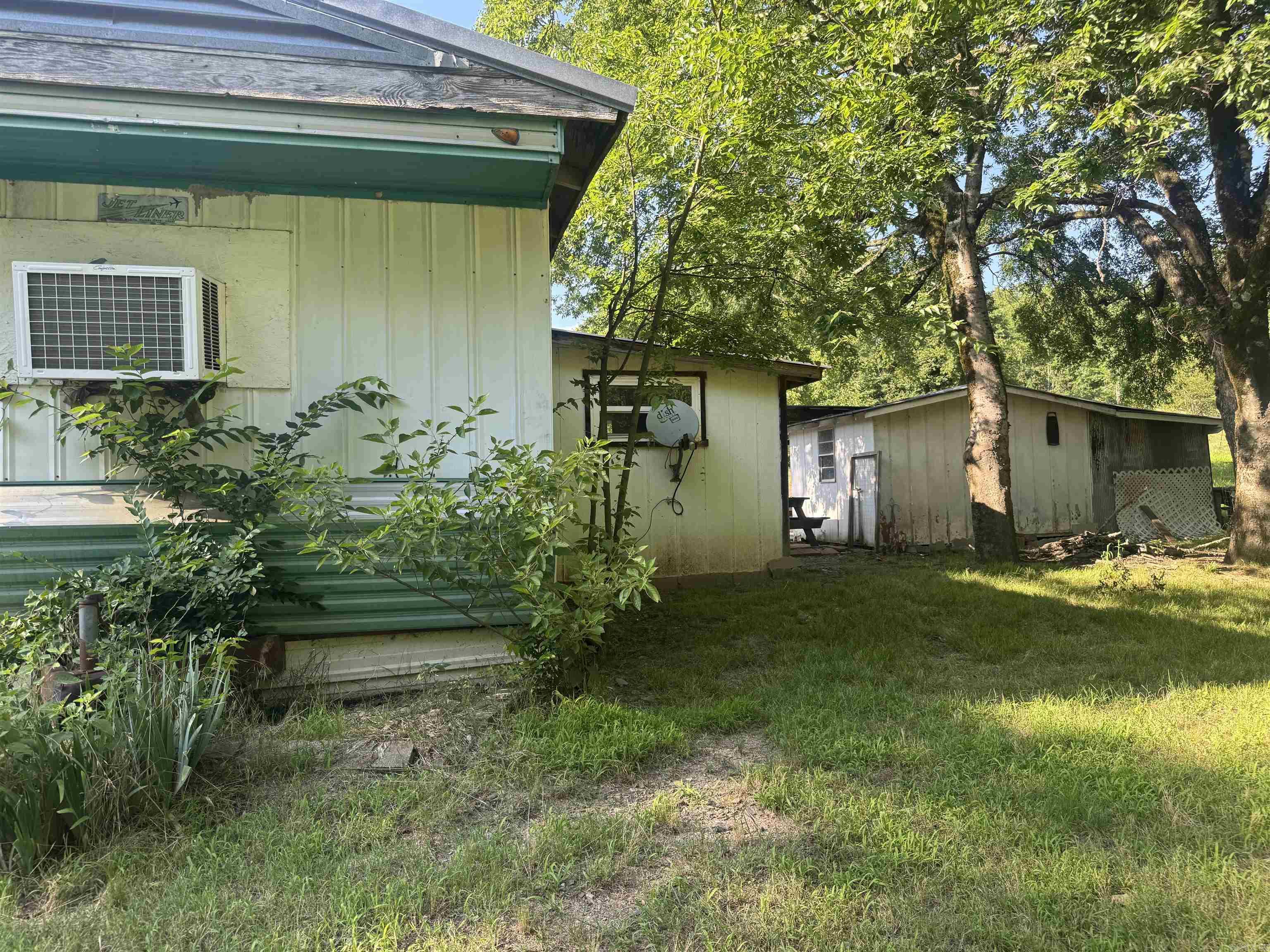 Investment Opportunity Awaits in Montgomery County on 4 lots!! 2 Bedrooms,1 bath mobile home with recent flooring updates, newer window units, etc. The property has room to place another mobile home to generate even more income.