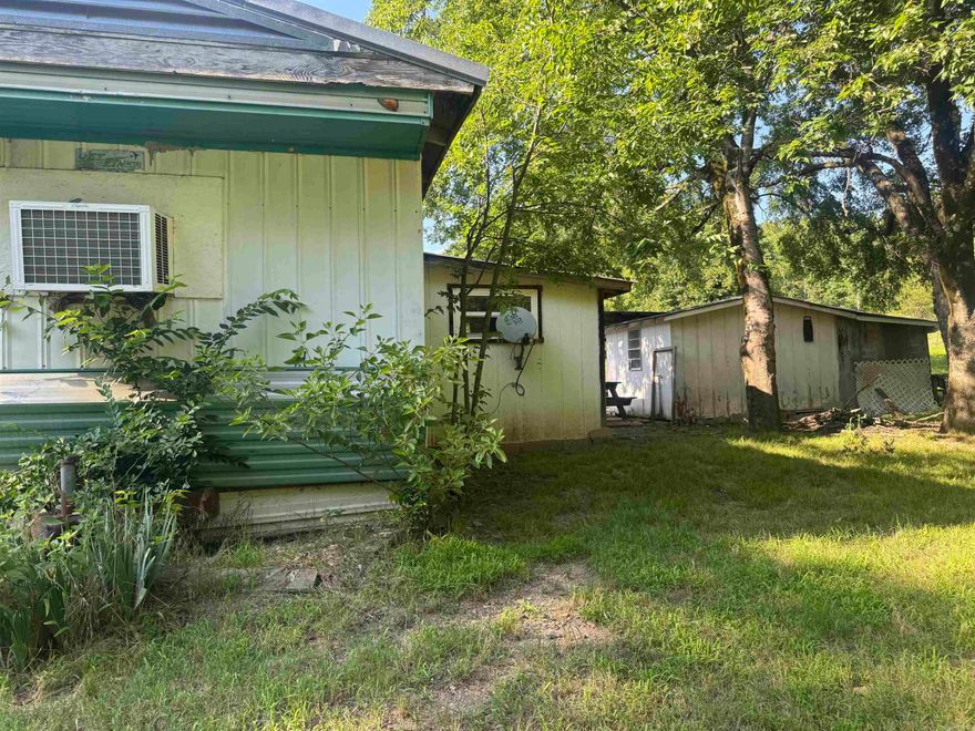 Investment Opportunity Awaits in Montgomery County on 4 lots!! 2 Bedrooms,1 bath mobile home with recent flooring updates, newer window units, etc. The property has room to place another mobile home to generate even more income.
