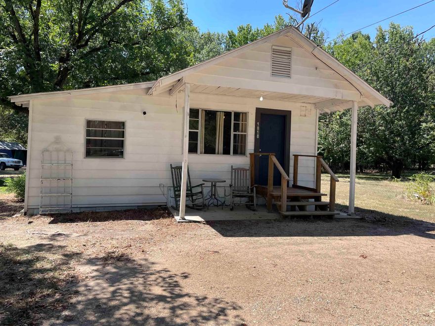 A small quaint little house sitting on a triangular shaped lot in the city limits of Warren.  Fresh paint, some new flooring and new fixtures.
