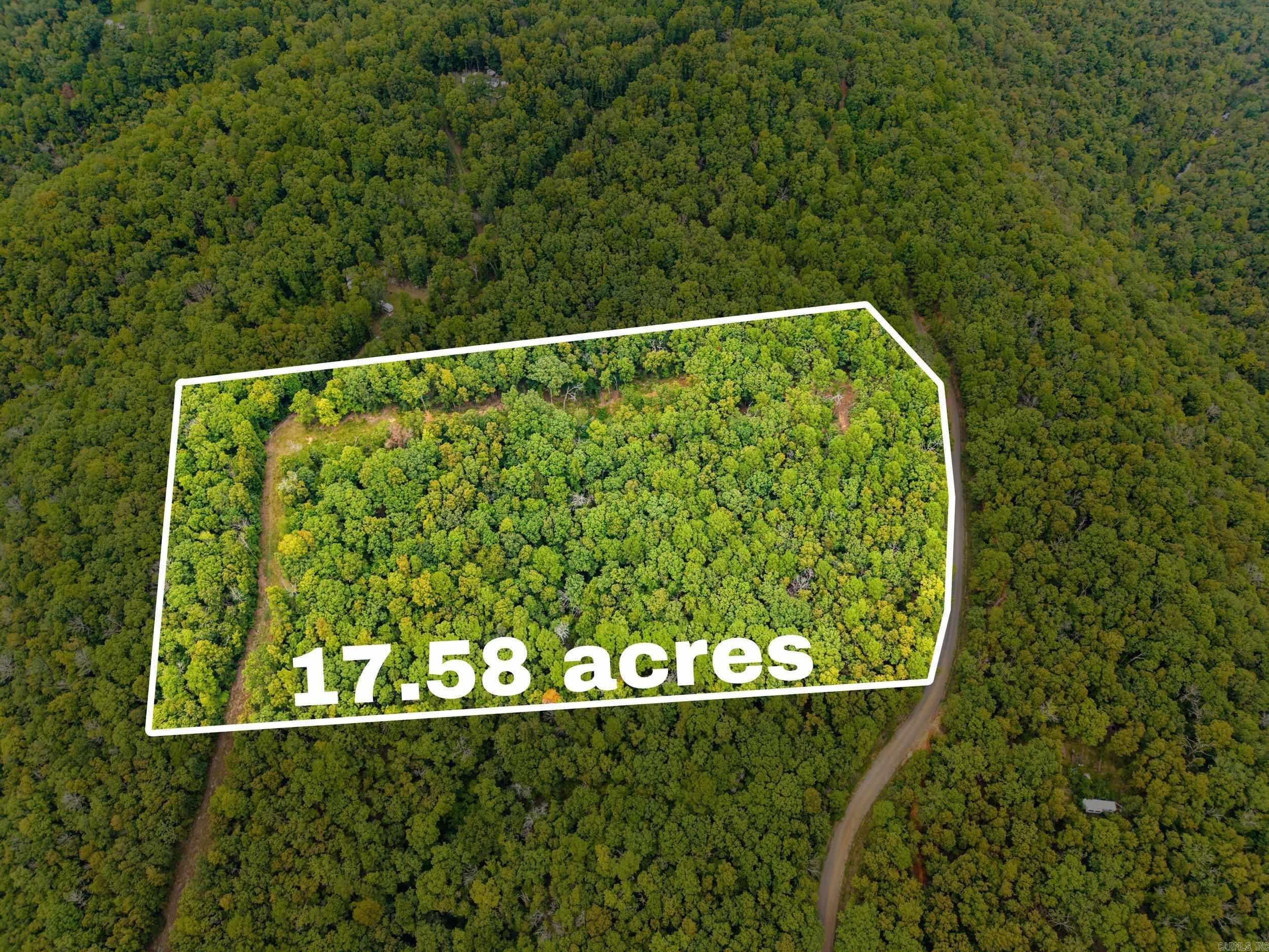 This piece of the Ozark Mountains is one you must see! Greers Ferry Lake and the Buffalo River are just a short drive away. Serene wooded mountain view property with power, 10 X 12 and 18' tall storage shed building. City water is available across the road and very close by. No restrictions! Mobiles allowed! Existing survey! Perk Test was completed!