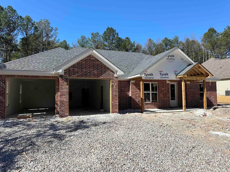 Welcome to this brand new construction home within the beautiful, gated community of Hot Springs Village! This home offers 4 spacious bedrooms, with 2 bathrooms. The exterior of the home is fully brick, and there will be a fireplace on the back porch that will make outdoor entertaining ideal. Inside features include a custom tile shower, custom cabinetry throughout, and quartz countertops. This home is perfectly located being just a few miles from the East gate, and close to the Granada golf course. There is still time to pick a few features if you call soon! Estimated completion is June 1, taxes is on lot only.