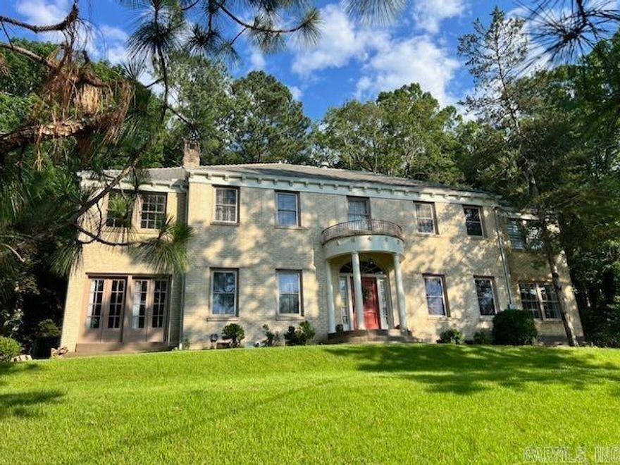 This executive home boasts a plethora of history, but modernization abounds with new plumbing, electrical, insulation, and structural improvements. This home has the original hardwood floors, tile baths, custom doors, and so much more! This home rests on nearly 2.5 acres near the National Park's North Mountain. For more information, email me at Rushinhome21@gmail.com today! TO SHOW: text Broker at 501-351-4540.